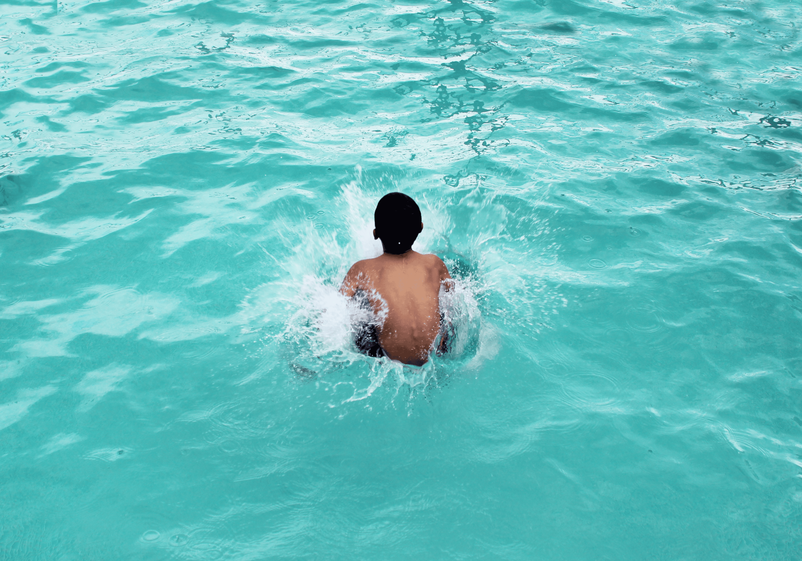 black kid swimming