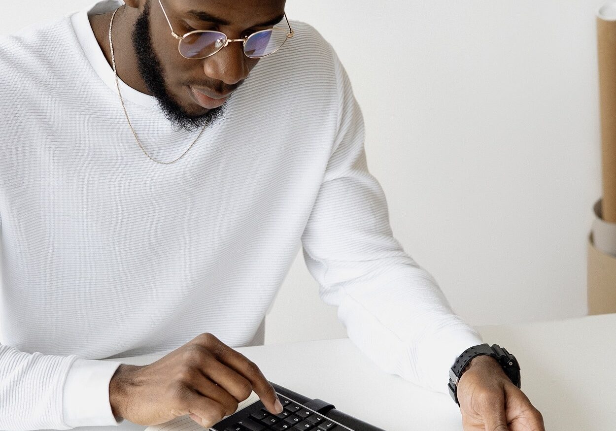 man using a calculator