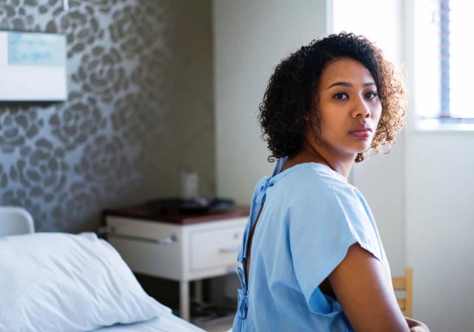 woman in a hospital gown