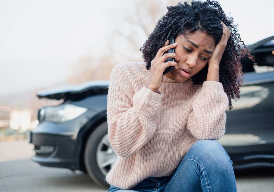 car accident victim making phone call