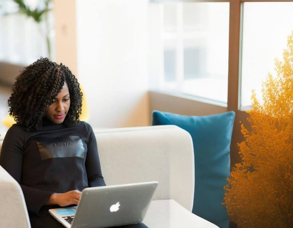 black woman on a laptop